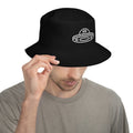 Men's black bucket hat with alien spaceship UFO graphic. Trippy streetwear and psychedelic anti-government cap